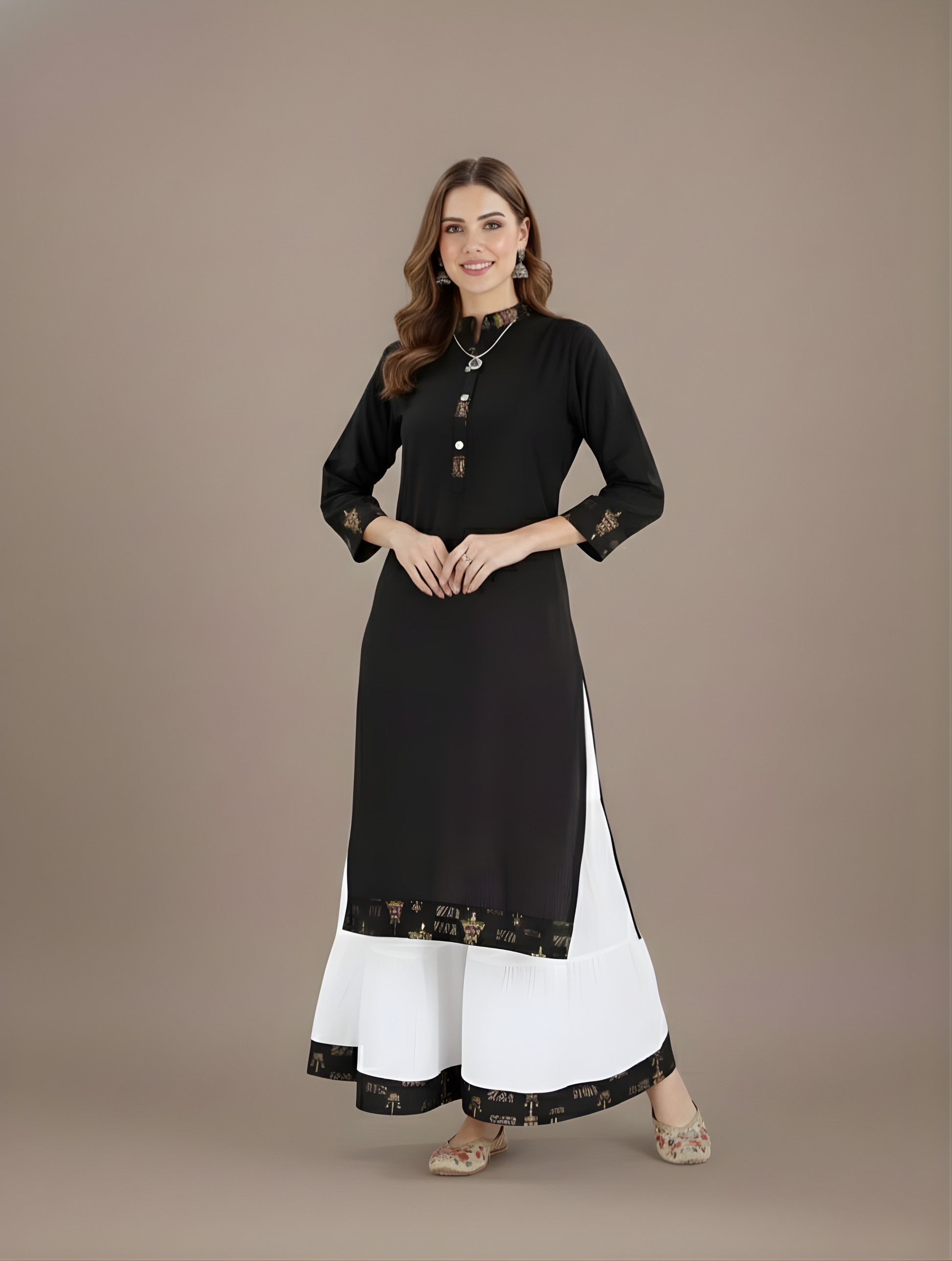 Woman wearing a black and white outfit on a brown background
