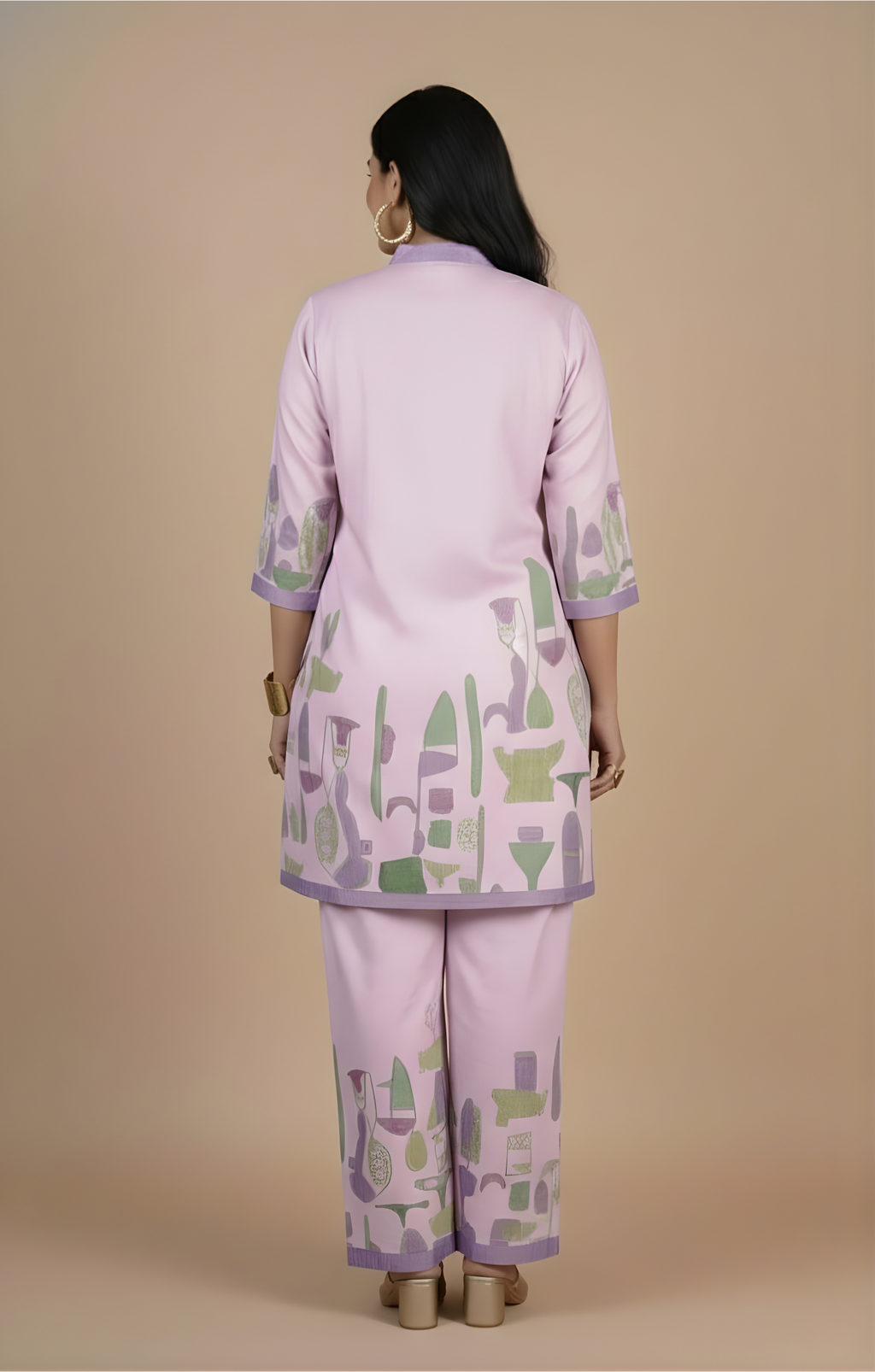 Woman wearing a light purple outfit with green and gray patterns on a beige background